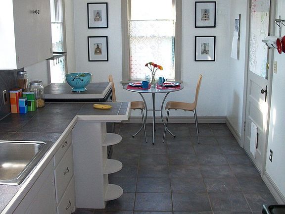 Wonderful remodeled kitchen, tile floors, eat-in area, pantry, cabinet space