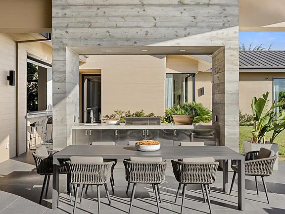 Relish alfresco dining on the patio, surrounded by the detailed scenic beauty and tranquility of ZeroOne.