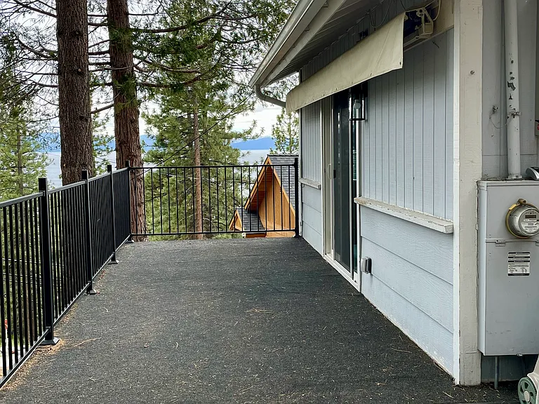 Side yard balcony with powered awning