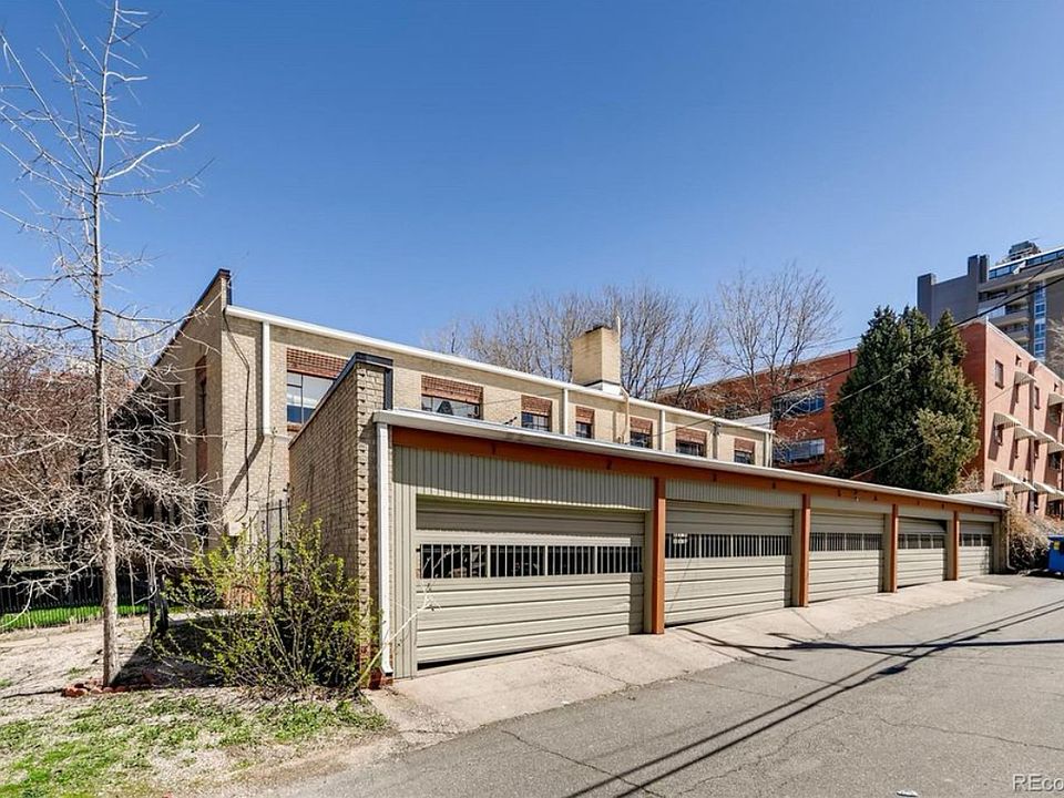 Covered garage in alley