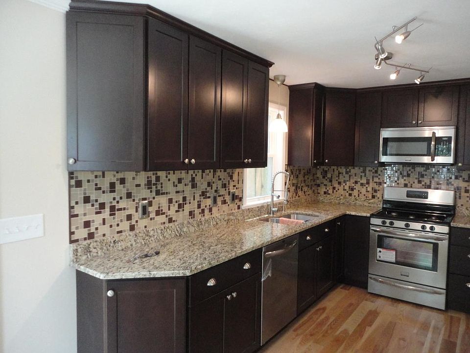 newly renovated graite and stainless kitchen