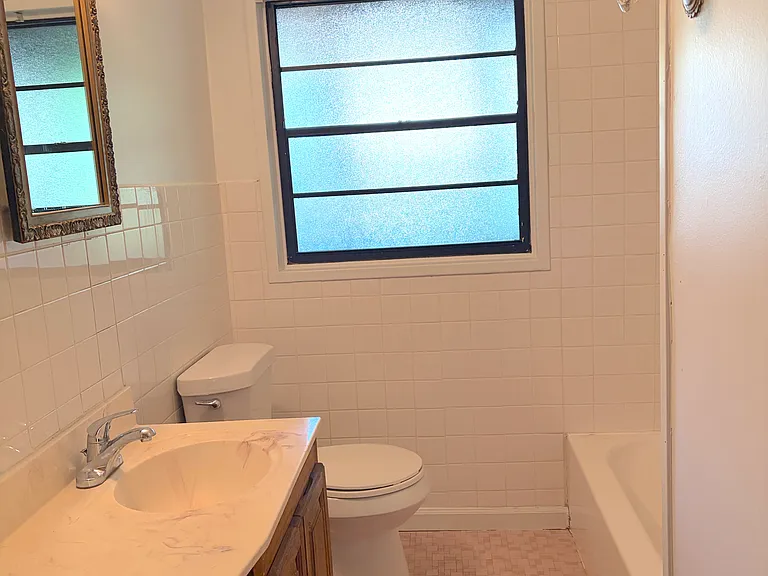 bathroom with tub shower