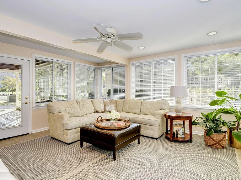 Bring groceries into house with no stairs to climb! This room is bright and lovely space.