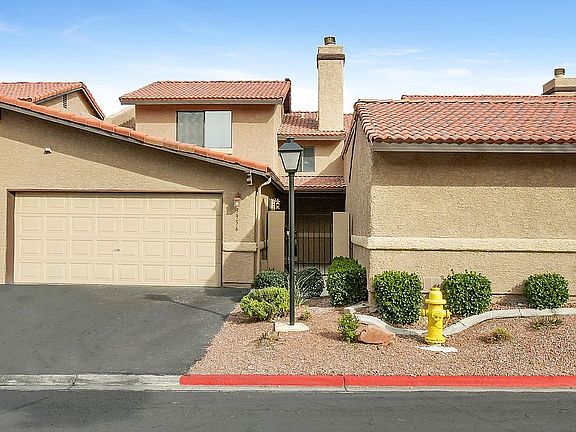 Entrance, driveway & garage