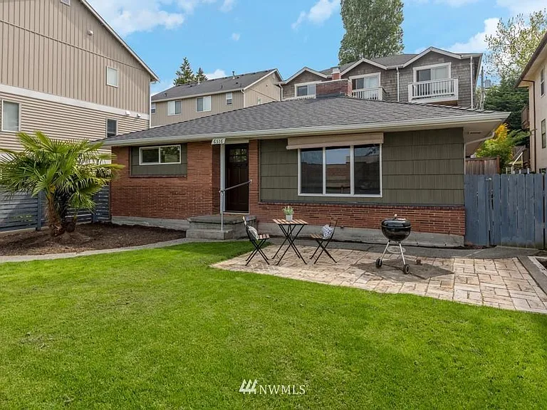 Front yard fenced around with a new BBQ and Smoker provided (not bbq in pic)