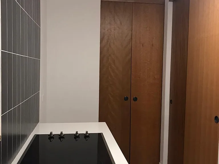 Flat glass cooktop and refrigerator space