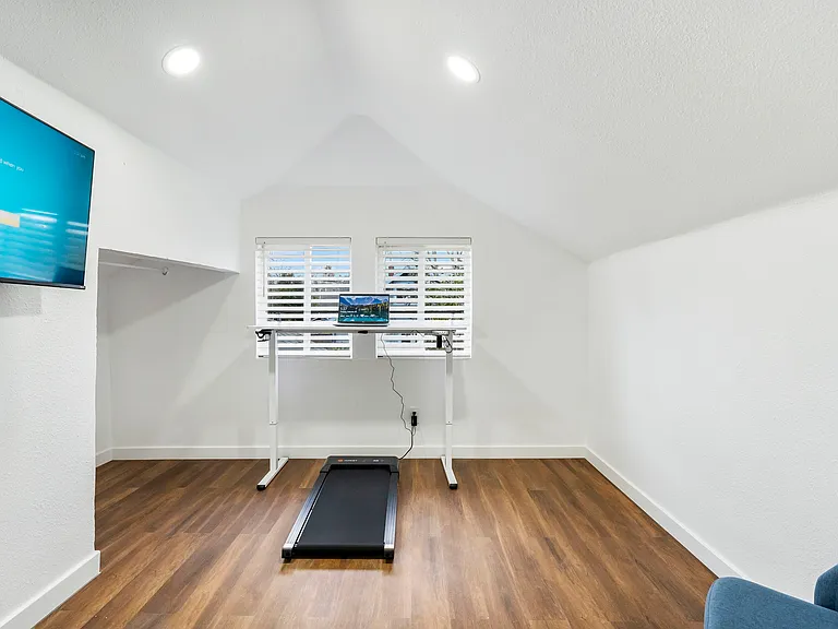 Desk with standup option, treadmill or chair.
