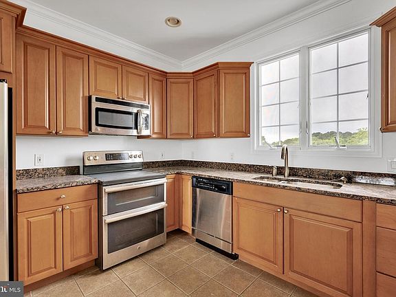 5th image of 9823 Golf Course Rd Unit 16