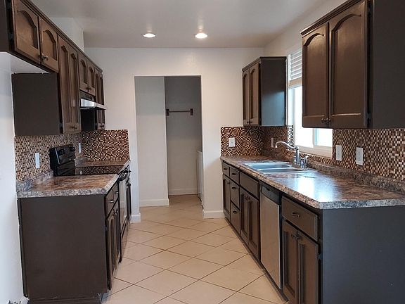 Kitchen/laundry room at the end.