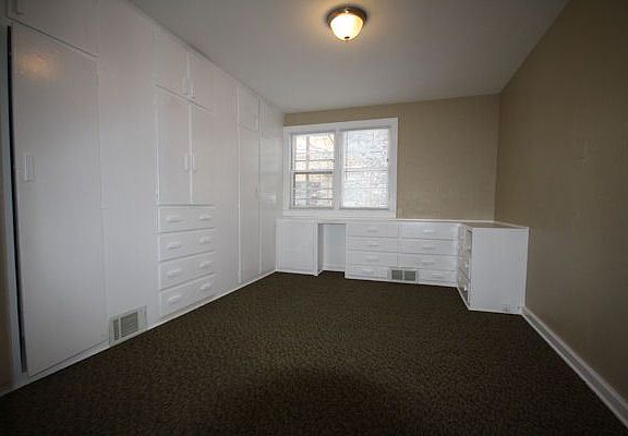 Bedroom with new carpeting