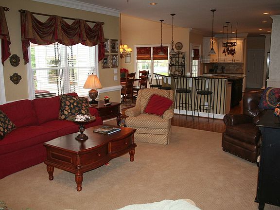 Family Room w/gas log fireplace open to kitchen