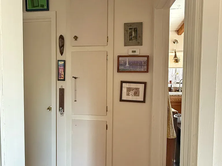 Hallway with built in cabinets