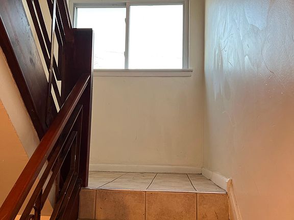 Stairwell to second floor unit
