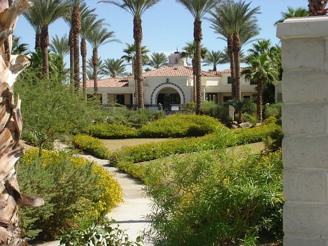 Your backyard overlooks this paseo with clubhouse in distance