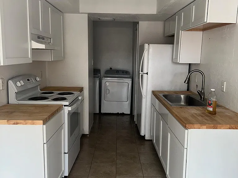 Kitchen, Recently remodeled, new cabinets, butcher block counter tops, sink, stove and fridge included