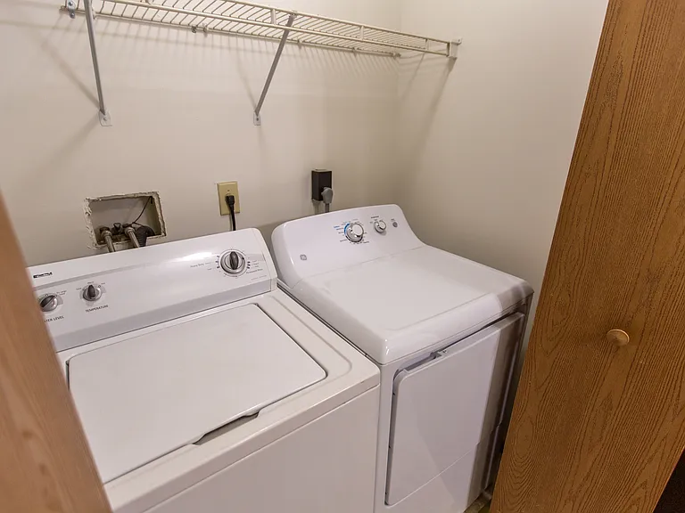 Cedar Ridge Laundry Room (floor plans may vary; some feature sliding doors, while others are enclosed rooms)