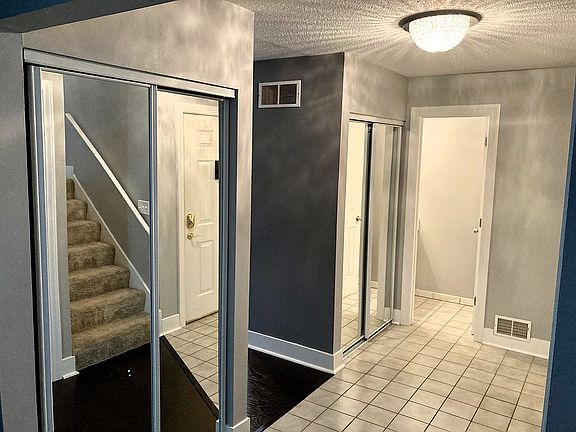Hallway closets & half bath