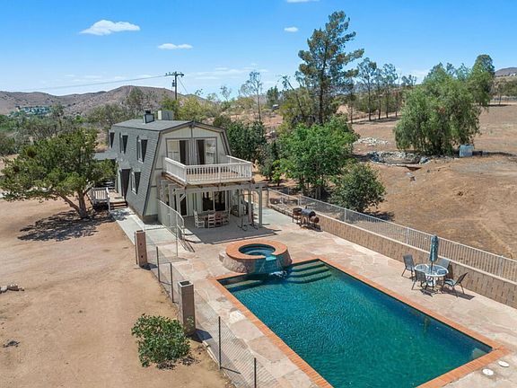Aerial shot of the home with pool.