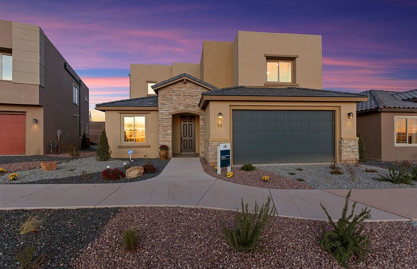 The Yucca model home at Colibri designed with stylish stone veneer accents.