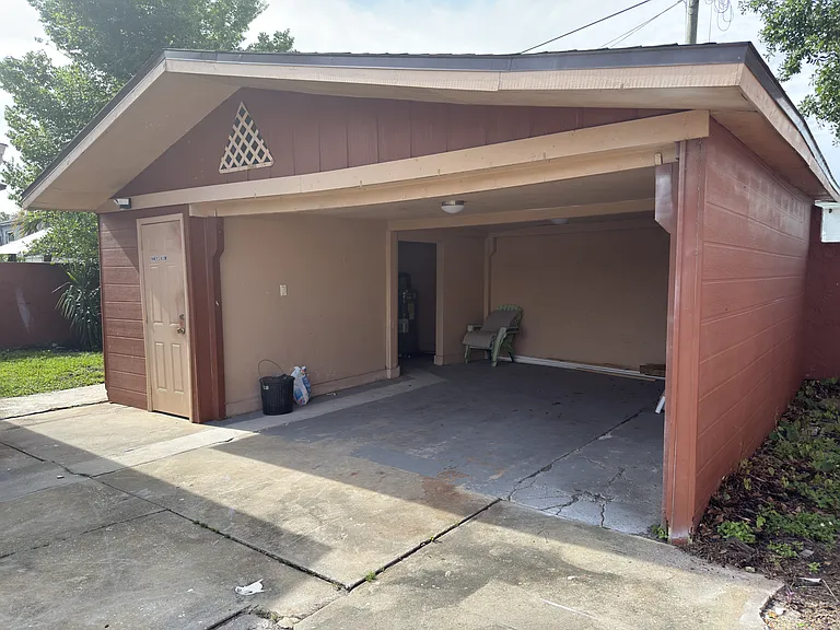 Detached 2 car garage- laundry room in garage to left side