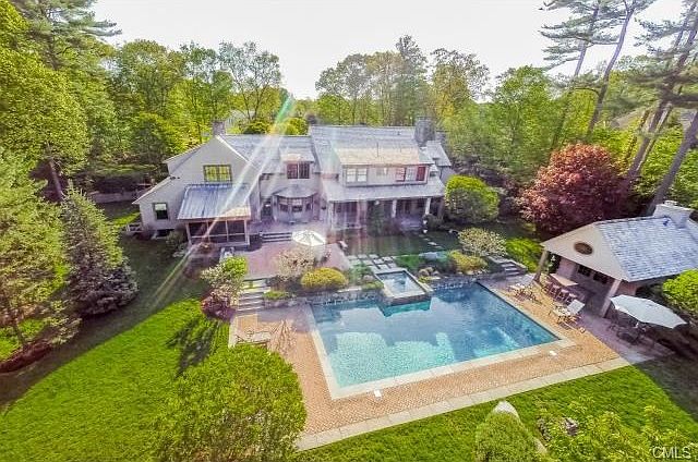 In addition, there is a lit tennis court, completing this Country Club Lifestyle.