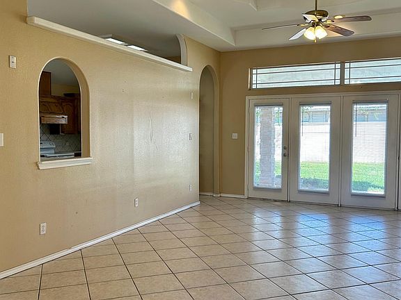 LIVING ROOM ENTRANCE TO KITCHEN
