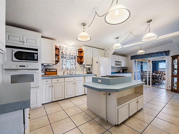 3rd image of 6827 S LAKE HENRY DRIVE NE