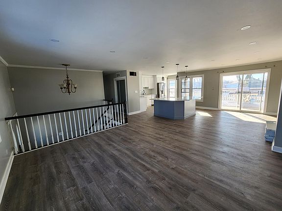 Second Floor: Living room, dining room, and kitchen. Spacious and Bright!