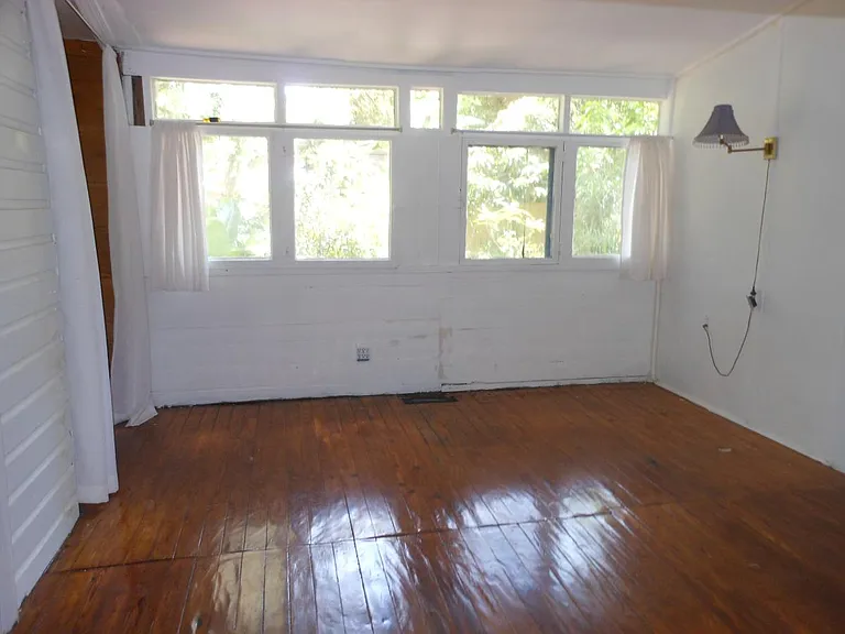 Master Bedroom - wall to back yard garden