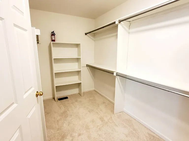 Master bedroom wall in closet