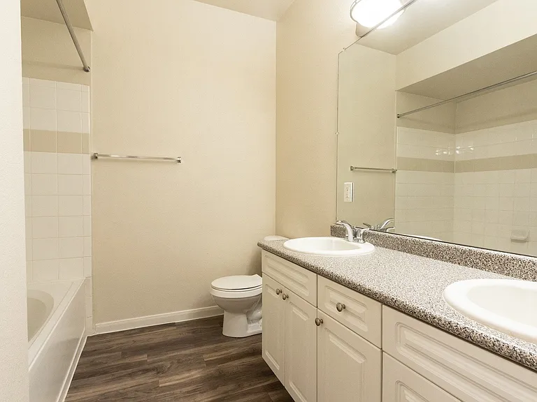 Bathrooms are complete with luxury tile showers and soaking tubs.