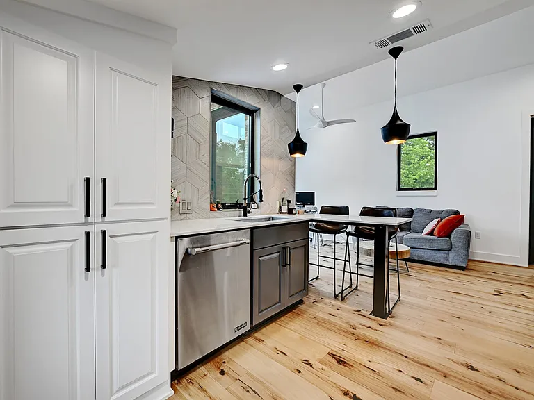 Full size washer and dryer built in kitchen cabinets