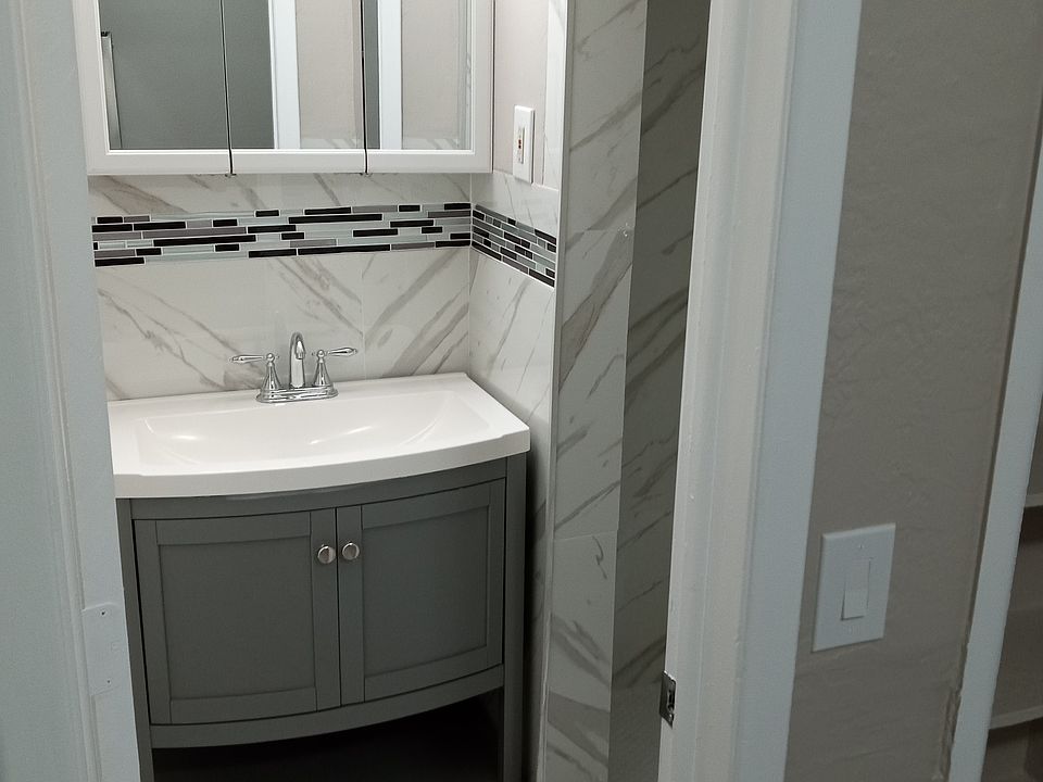 new toilet, vanity and shower