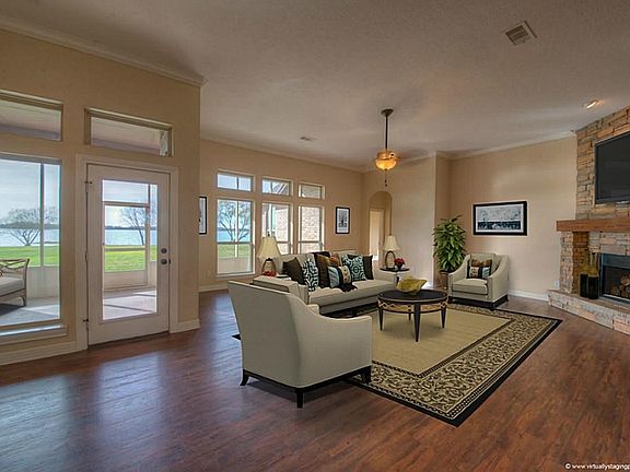 This is the perfect Texas size family room! Stunning view of backyard. Spacious and open for any simple or sophisticated design.(virtually staged)