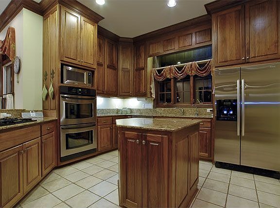 Kitchen has stainless appliances