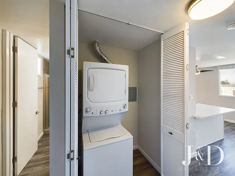 Newly Renovated Units Near the Beach with Parking — Photo 23