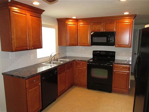 Modern Cabinetry and Can Lighting in Kitchen