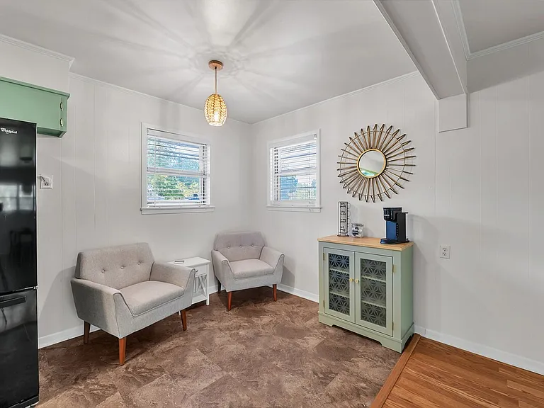 Cozy sitting area off the kitchen with coffee station.