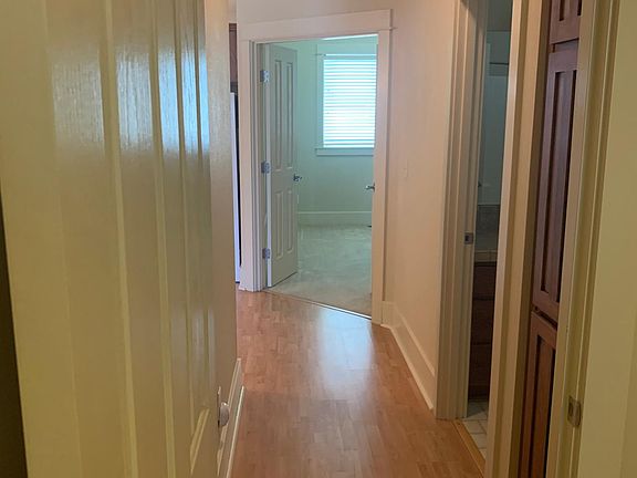 Hall to two bedrooms and second bath
