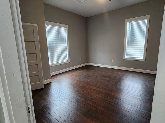 Front Bedroom (2 of 3) with real hardwood flooring