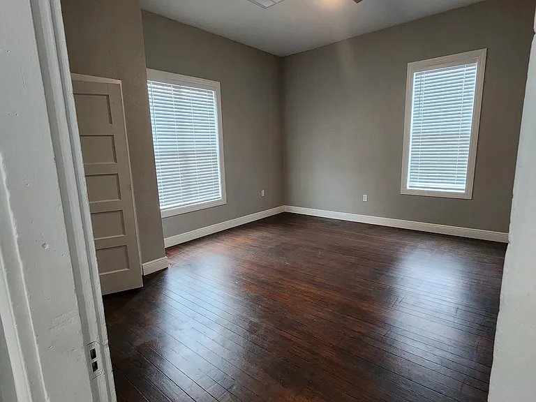 Front Bedroom (2 of 3) with real hardwood flooring