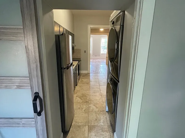 View of Kitchen from Bedroom / Barn Door