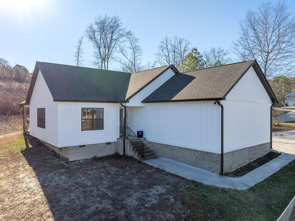 1st image of 1310 Woodland Cove Pl NE