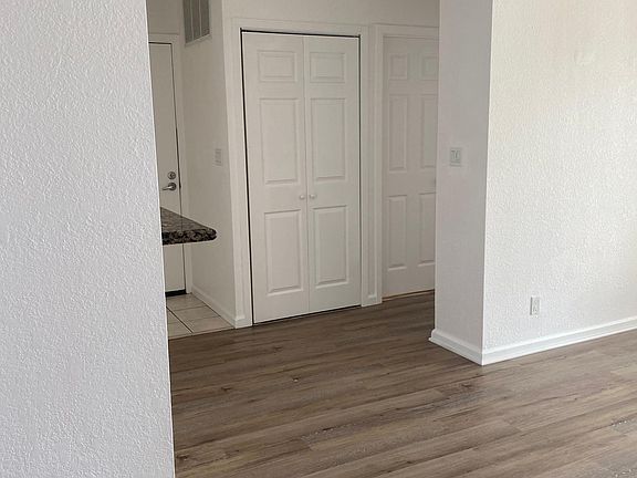 Hallway with in unit laundry