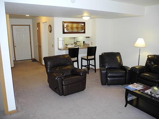 Another view of living room showing Breakfast Bar area