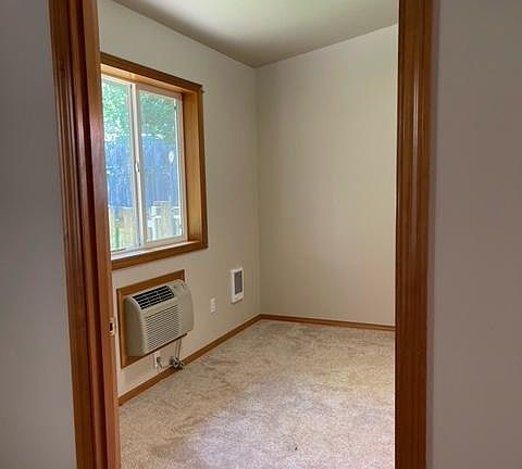 Bedroom with Air Conditioning Unit