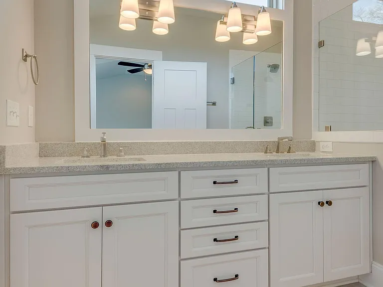 Granite counters and double vanities