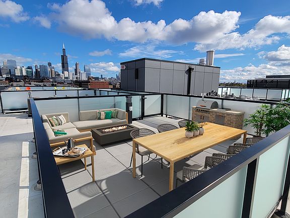 Private paver rooftop terrace - virtually staged
