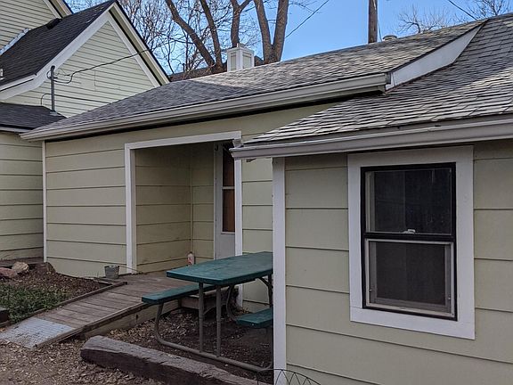 A view from the driveway looking at the house.