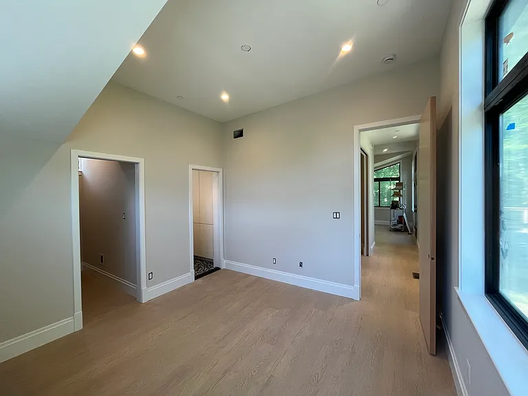 PRIMARY BEDROOM - looking down hallway